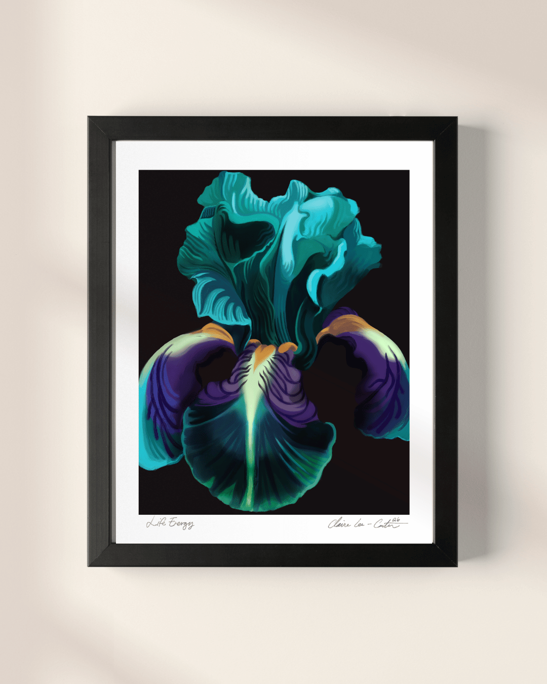 Framed artwork of a vibrant teal and purple iris on a beige wall.